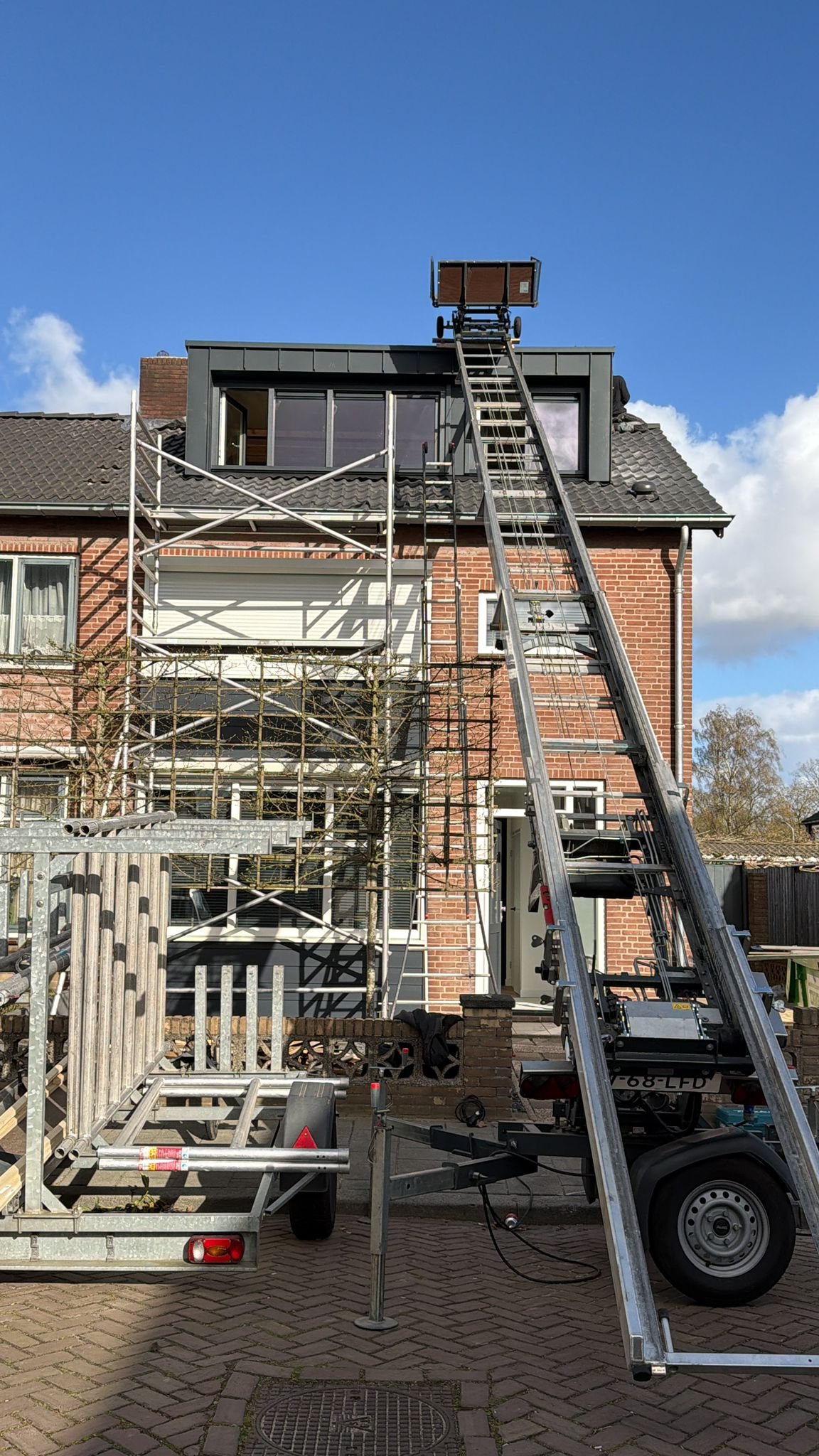 dakdekker met stijger